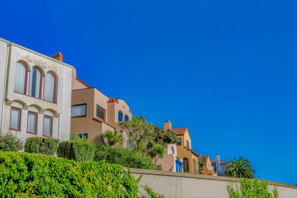 istock Homes with arched windows against blue sky in San Francisco California 1469664248