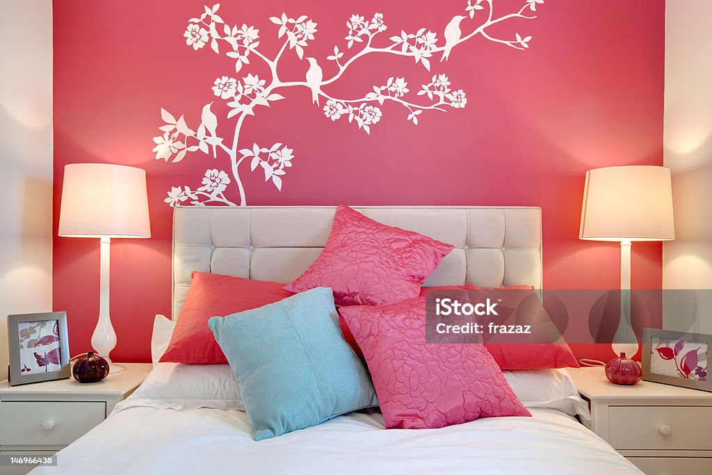 Bedroom style close up image of bed dressed in a contemporary chic style Mural Stock Photo