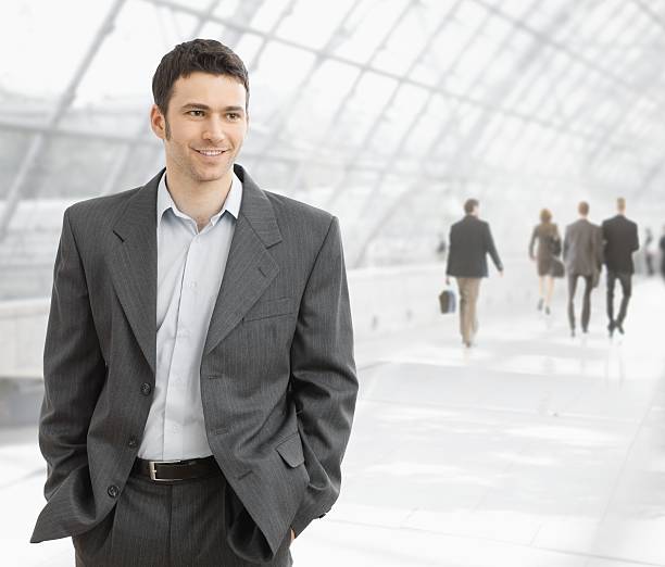 istock Businessman standing in office lobby 146966488