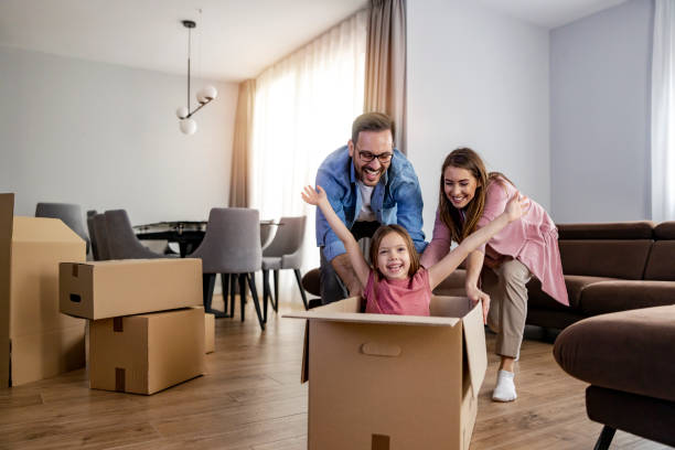 istock Happy family is moving into new home 1469665437