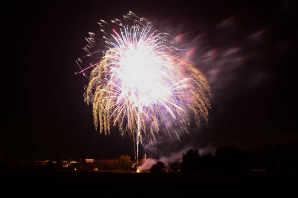 istock Sparkling explosions of fireworks and fireworks, isolated and blurred on black night background, element for design 1469665601