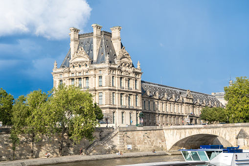 Museum Louvre in Paris, France. View from Seine river