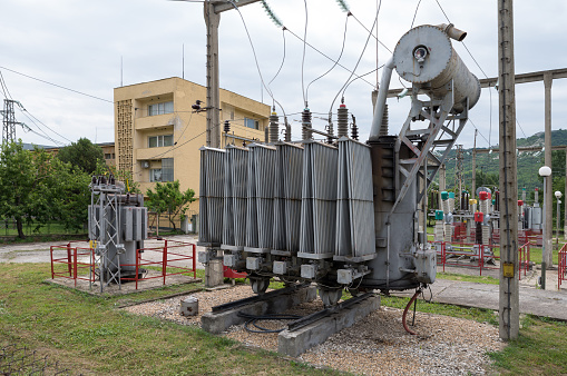 Power transformer in substation. Transformers transfer the energy to the substation or the public electricity supply.