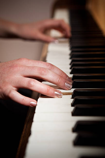 istock Woman playing piano 146966822