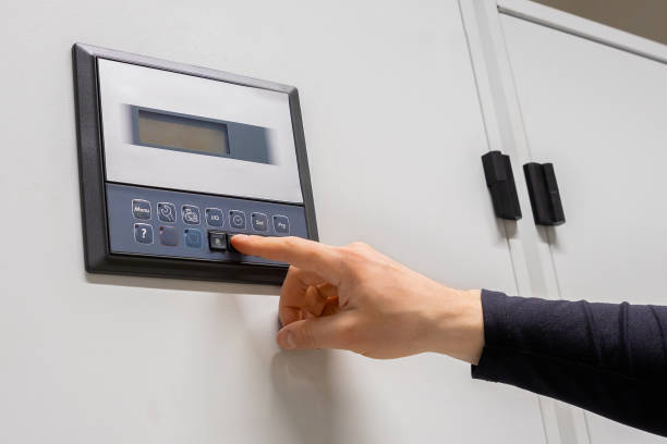 istock Close-up of Professional Engineer Adjusting Air Conditioner In Datacenter 1469669675