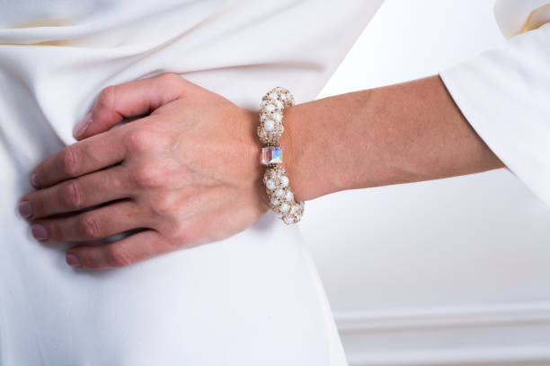 istock Woman`s hand with jewelry 1469669730