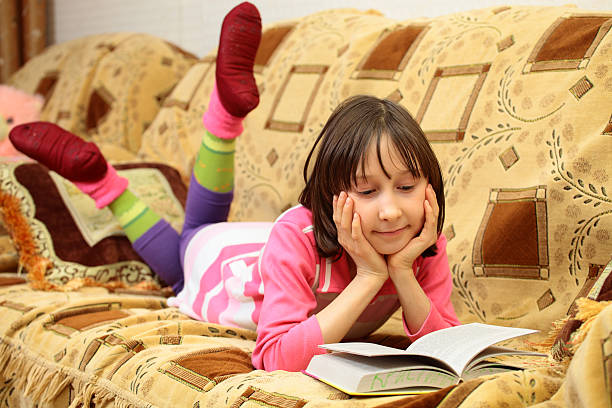 istock Happy girl with a book 146967194