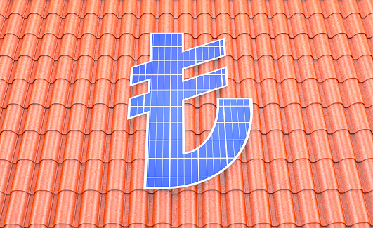 Solar panel in the form of a Turkish Lira sign on a roof made of roof tiles