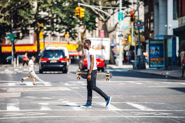 istock Young man skating in New York 1469672142