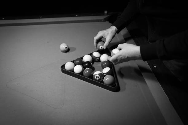 Billiard balls are sorted on the billiard table