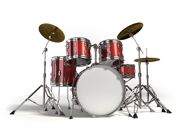 Close-up of red drum set on white background stock photo