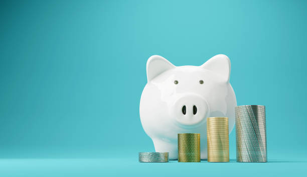 istock Piggy bank and money tower, 3D rendering 1469684887