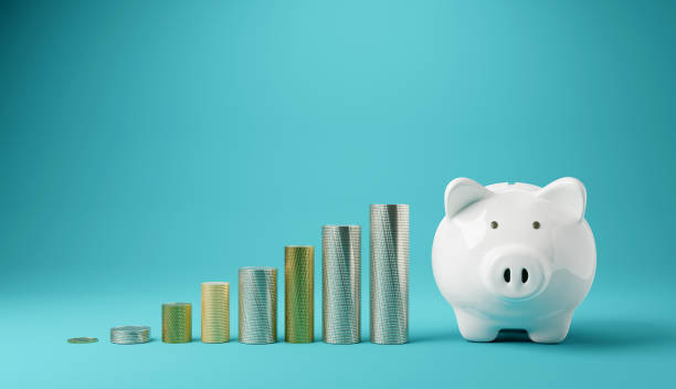 istock Piggy bank and money tower, 3D rendering 1469684888