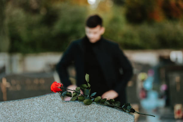 istock Man in the cemetery 1469689731