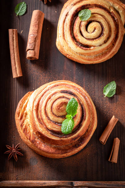 Tasty and sweet cinnamon rolls as swedish dessert. Tasty and sweet cinnamon rolls as swedish dessert. Scandinavian dessert. kanelbulle stock pictures, royalty-free photos & images