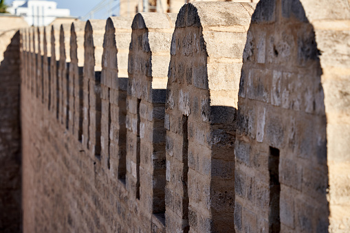 Battlements on the wall of a medieval fortification in Tunisia