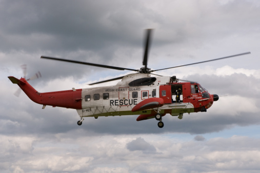 Frankfurt, Germany - September 21, 2023: A Kaman K-Max medium lift helicopter of ROTEX Aviation AG operating on a construction site in Frankfurt, Germany. The Kaman K-MAX or K-1200 is a helicopter with intermeshing rotors designed and produced by the American manufacturer Kaman Aircraft.