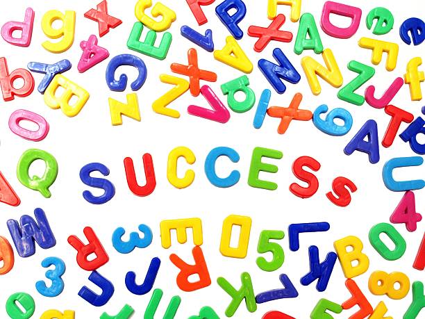 Letter Fridge Magnets - Success stock photo