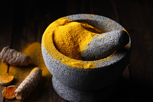 Mortar and Pestle with Turmeric