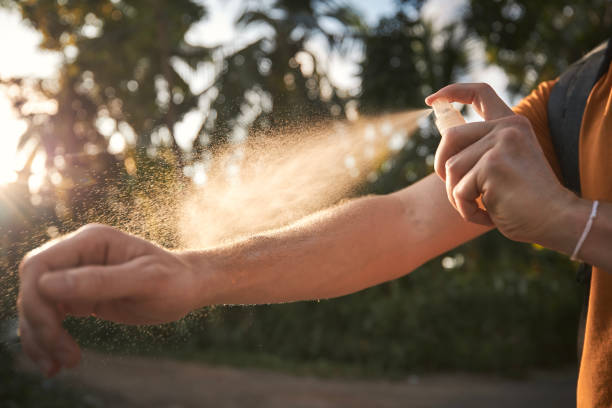 istock Man is applying insect repellent on his hand 1469707812