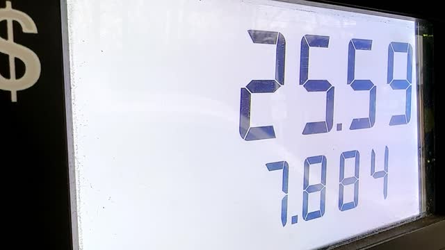 Display from gasoline pump with price number changing