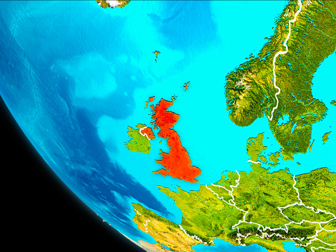 United Kingdom highlighted in red on planet Earth with visible borders. 3D illustration. Elements of this image furnished by NASA.