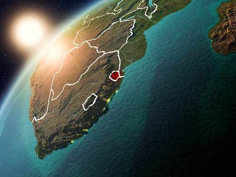 Swaziland during sunset highlighted in red on planet Earth with visible country borders. 3D illustration. Elements of this image furnished by NASA.