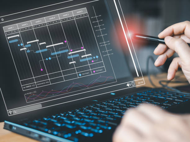 istock Job management concept. Businessman using digital pen on virtual hologram job water fall or timeline for checking job planning. 1469725708