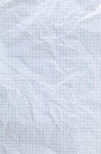 Crumpled graph paper background.