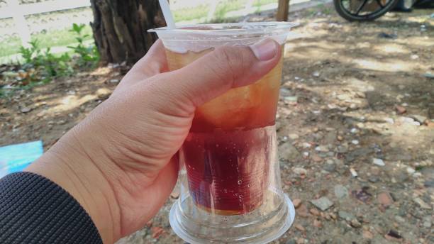 istock sweet iced tea in hand 1469731660