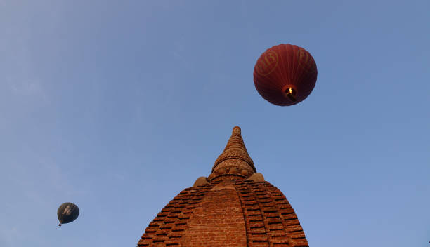 Bagan, Myanmar - Feb 19, 2016. Hot air balloons flying over the temples in Bagan, Myanmar. Hot air balloon ride in Bagan is the most popular tourist activity in Bagan.