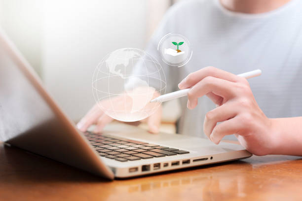 Teenagers use laptop for learning- analyze global warming, finding green solutions and sustainable development.