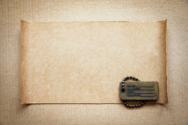 Name badge on the blank cardboard paper texture background.