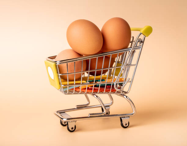 istock Chicken eggs pile in shopping cart, trolley 1469735873