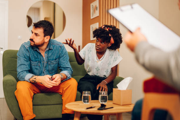 istock Diverse couple on a therapy session in a psychologist office 1469747419