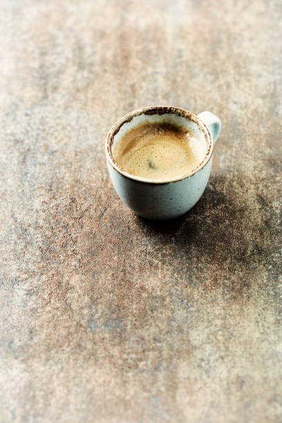 istock Cup of coffee on rustic stone background. Copy space. 1469749577