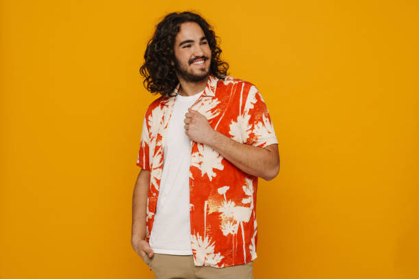 istock Positive hispanic guy posing isolated over yellow wall 1469753484