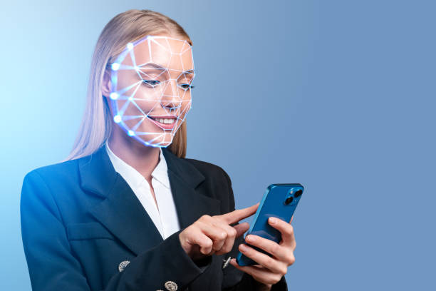 istock Businesswoman finger touch smartphone, smiling and using biometric scanning 1469756614
