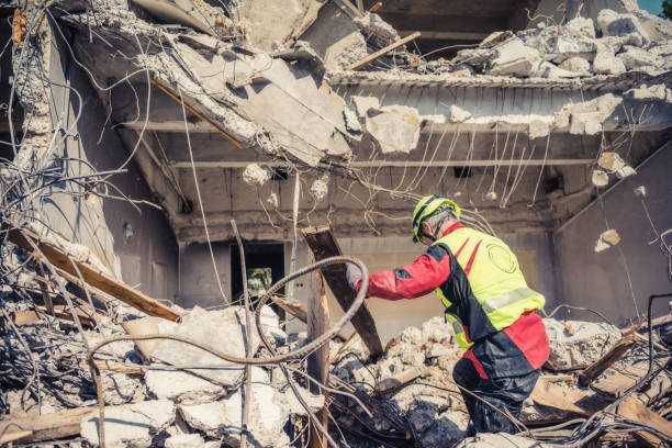 istock rescue forces search through a destroyed building 1469756660
