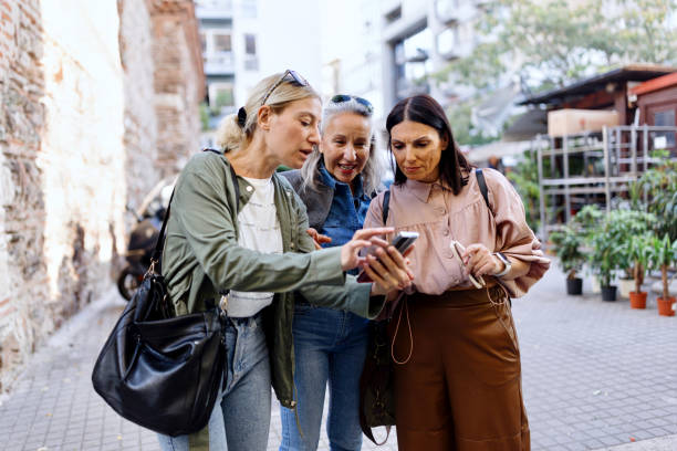 Lost friends looking for direction on their phone