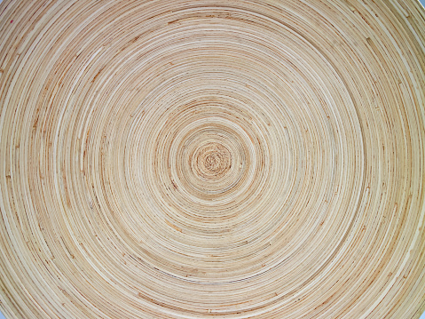 Circular texture of a wooden bowl