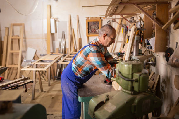 istock Carpenter creating furniture 1469768848