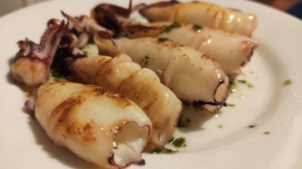 istock Grilled cuttlefish squid with parsley sauce and garlic 1469769974