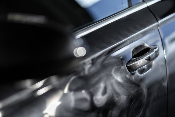 istock Modern car in a detailing workshop being worked on, 1469770399