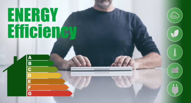 istock Man calculating energy buildings efficiency class. Ecological and bio energetic house concept. 1469770417