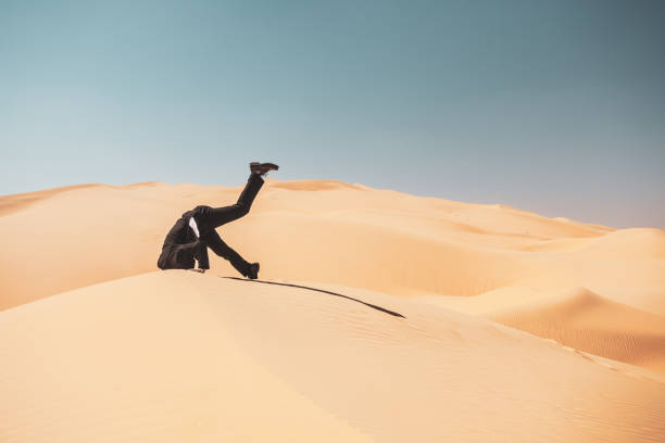 istock Man burying his head in the sand - metaphor 1469770468