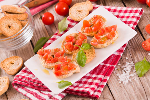 istock Friselle with cherry tomatoes and basil. 1469771856