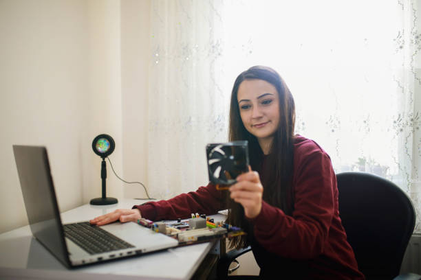 istock young woman studying computer engineering by distance education at university from laptop watching her lectures on laptop 1469776074