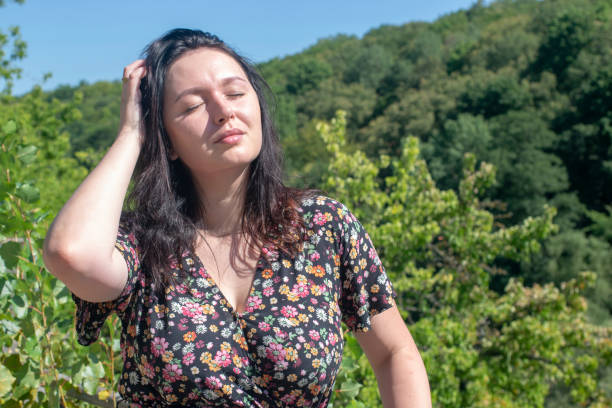 White girl basking in the sun. stock photo