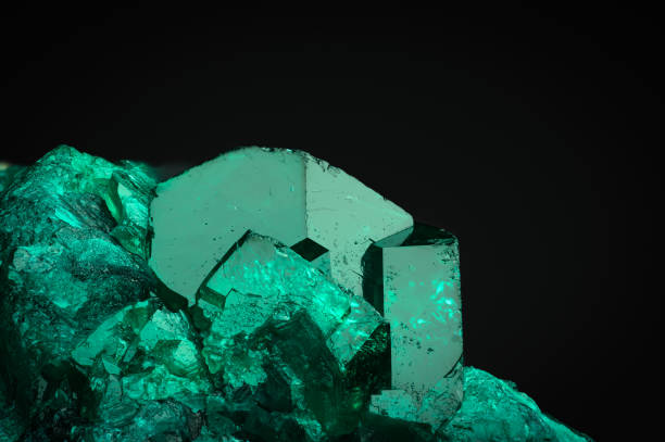 istock Dioptase crystal on black background. 1469780105
